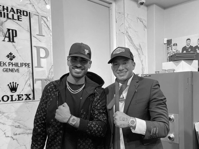 Neel Alwani with a client in his showroom